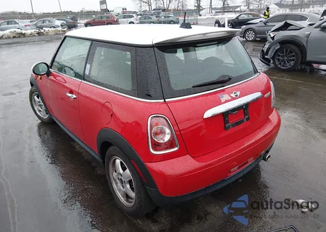 2011 Mini Cooper z USA, uszkodzony, nr VIN WMWSU3C53BT099384